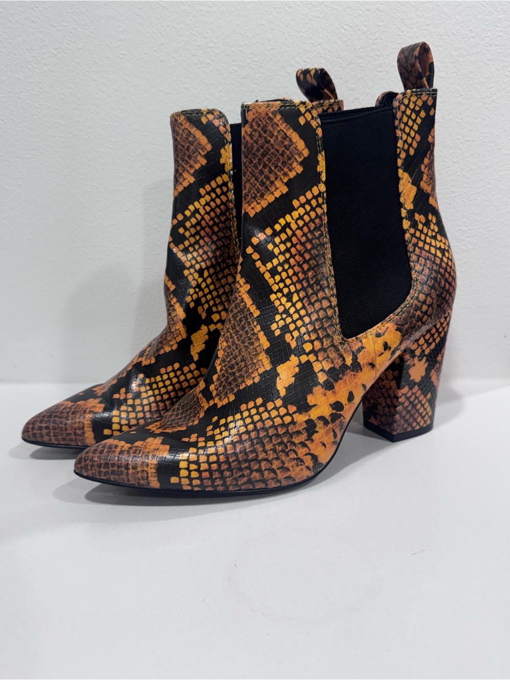 Ladies Steve Madden Orange and Black Snake-Print Pointed Chelsea Booties